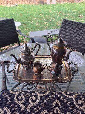 Oneida 4 Piece Silverplated Tea and Coffee Set. Round platter is 15" round. One